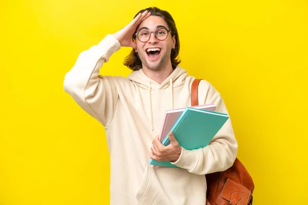 Young Student Handsome Man Isolated Yellow Background Surprise Expression — Stock fotografie