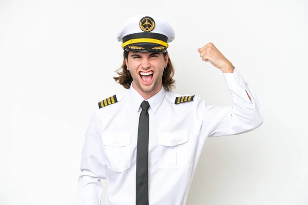 Handsome Airplane Pilot Isolated White Background Doing Strong Gesture — Zdjęcie stockowe