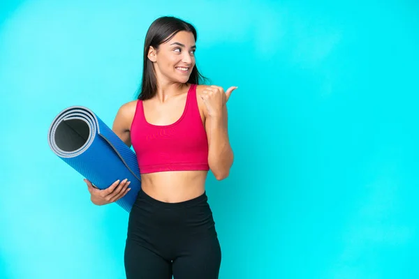 Young Sport Caucasian Woman Going Yoga Classes While Holding Mat — Stok fotoğraf