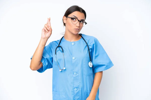 Young Nurse Woman Isolated White Background Fingers Crossing Wishing Best —  Fotos de Stock
