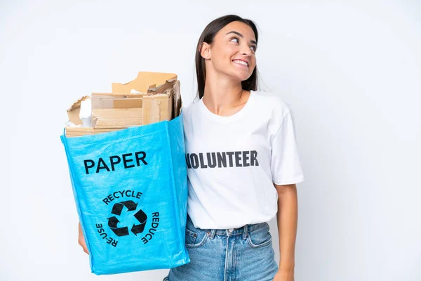 Young Caucasian Woman Holding Recycling Bag Full Paper Recycle Isolated — Stock fotografie