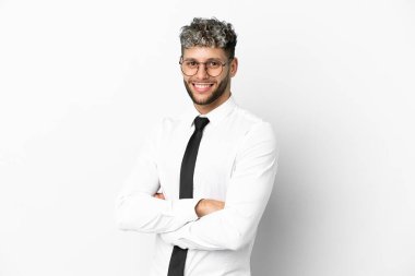 Business caucasian man isolated on white background with arms crossed and looking forward