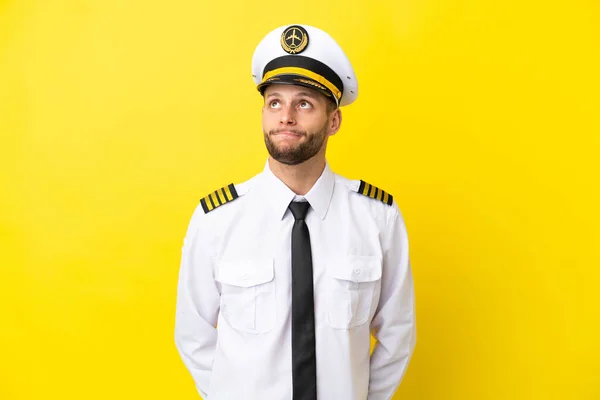 Airplane Caucasian Pilot Isolated Yellow Background Looking — Fotografia de Stock
