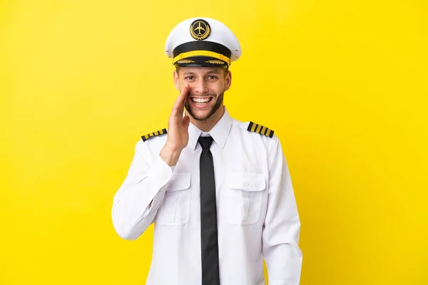 Airplane Caucasian Pilot Isolated Yellow Background Shouting Mouth Wide Open — Stockfoto