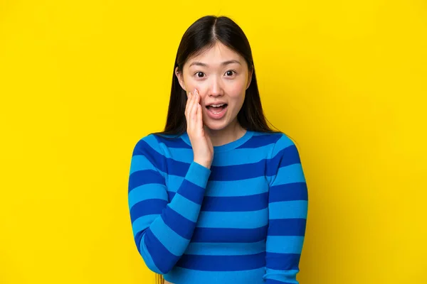 Young Chinese Woman Isolated Yellow Background Surprise Shocked Facial Expression —  Fotos de Stock