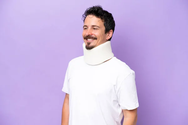 Young Caucasian Man Wearing Neck Brace Isolated Purple Background Looking — ストック写真