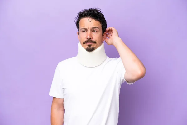 Young Caucasian Man Wearing Neck Brace Isolated Purple Background Having —  Fotos de Stock