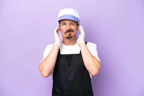 Fishmonger Man Wearing Apron Isolated Purple Background Frustrated Covering Ears — Zdjęcie stockowe