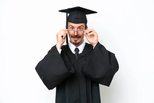 Young University Graduate Man Isolated White Background Glasses Surprised — Stok fotoğraf