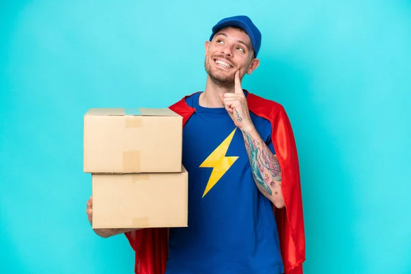 Super Hero Delivery Man Isolated Background Thinking Idea While Looking — 스톡 사진