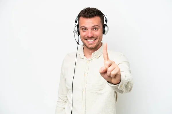 Telemarketer Caucasian Man Working Headset Isolated White Background Showing Lifting — Stok fotoğraf