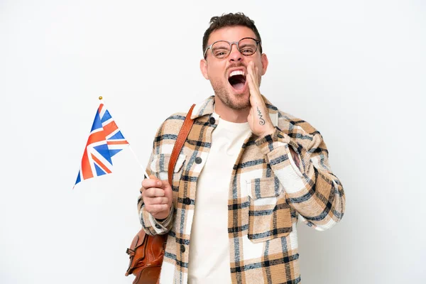 Young Hispanic Man Holding United Kingdom Flag Isolated White Background — Stock fotografie