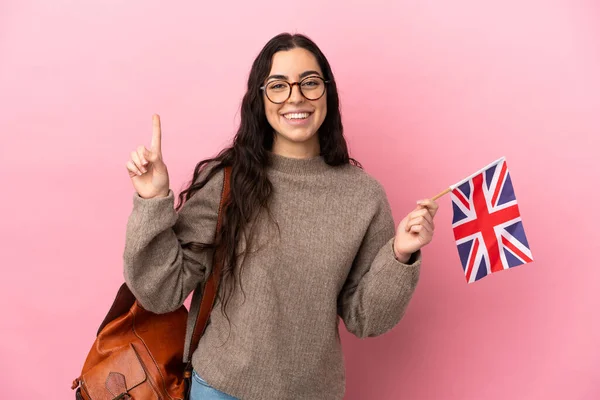 Junge Kaukasische Frau Mit Einer Britischen Flagge Auf Rosa Hintergrund — Stockfoto