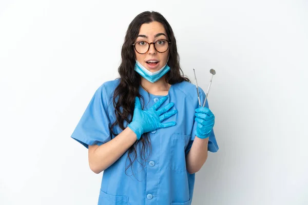 Young Woman Dentist Holding Tools Isolated White Background Surprised Shocked — Zdjęcie stockowe
