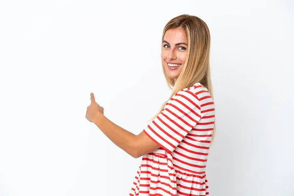 Blonde Uruguayan Girl Isolated White Background Pointing Back —  Fotos de Stock