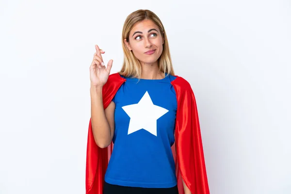 Super Hero Caucasian Woman Isolated Background Fingers Crossing Wishing Best — Foto Stock