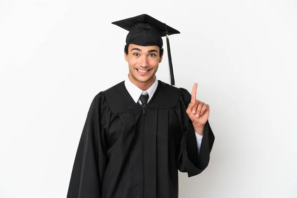 Молодий Випускник Університету Над Ізольованим Білим Тлом Вказуючи Індексний Палець — стокове фото