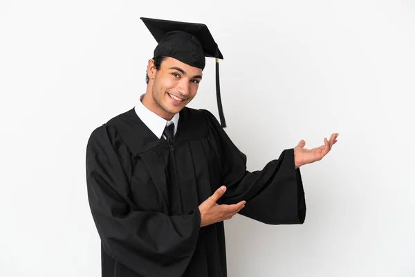 Young University Graduate Isolated White Background Extending Hands Side Inviting — Stock Photo, Image