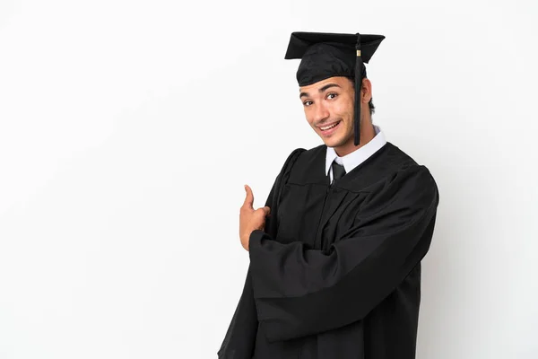Young University Graduate Isolated White Background Pointing Back — Foto Stock