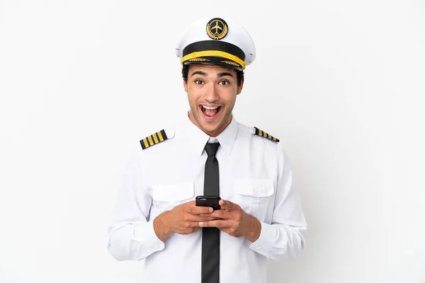 Airplane Pilot Isolated White Background Surprised Sending Message — Stockfoto