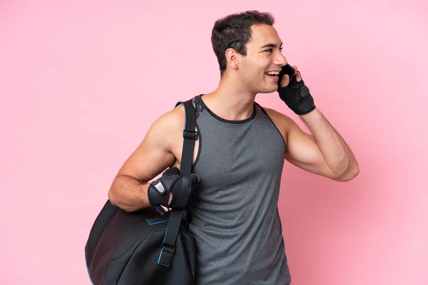 Young Sport Caucasian Man Sport Bag Isolated Pink Background Keeping — 图库照片