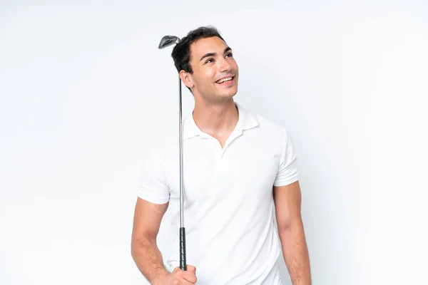 Young Caucasian Man Isolated White Background Playing Golf Looking While — Stok fotoğraf