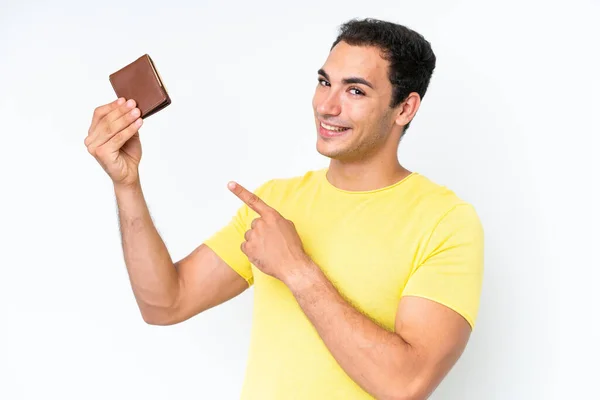 Young Caucasian Man Holding Wallet Isolated White Background Pointing — Stock fotografie