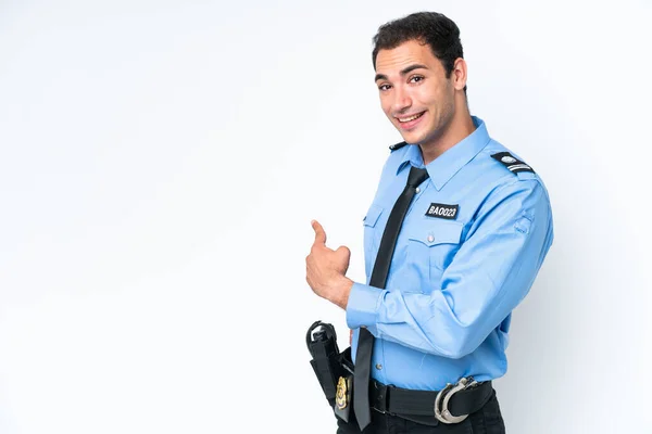 Young Police Caucasian Man Isolated White Background Pointing Back — Zdjęcie stockowe