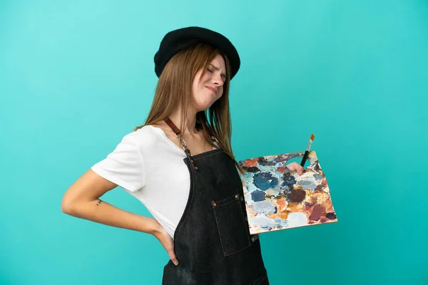 Młoda Artystka Angielska Kobieta Trzyma Paletę Odizolowanych Niebieskim Tle Cierpiących — Zdjęcie stockowe