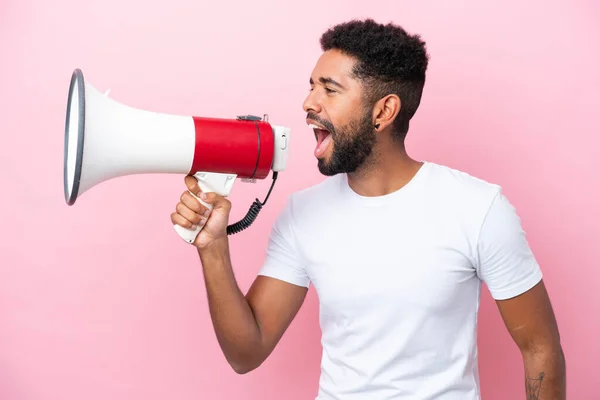 Young Brazilian Man Isolated Pink Background Shouting Megaphone Announce Something — 스톡 사진
