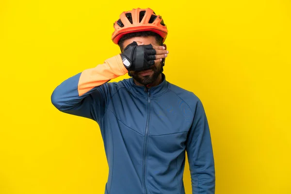 Young Cyclist Brazilian Man Isolated Yellow Background Covering Eyes Hands — Foto de Stock