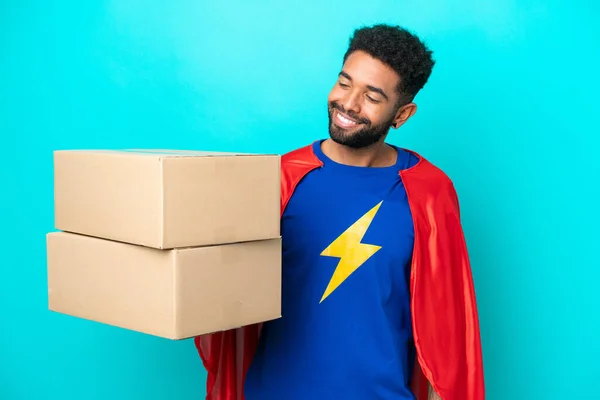 Super Hero Delivery Brazilian Man Isolated Blue Background Looking Side — Stock Photo, Image