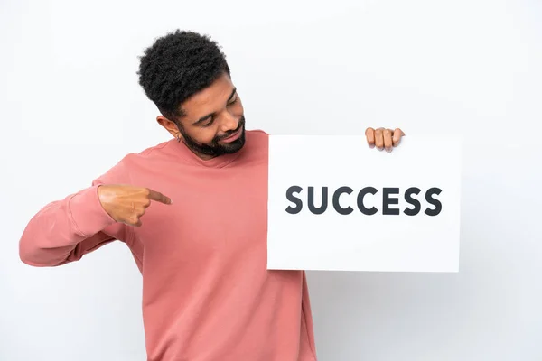 Young Brazilian Man Isolated White Background Holding Placard Text Success — Fotografia de Stock