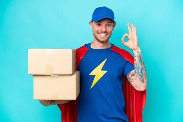 Super Hero Delivery Man Isolated Background Showing Sign Fingers — Stock Photo, Image