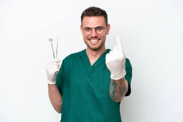 Young Caucasian Dentist Man Isolated White Background Doing Coming Gesture — Stockfoto