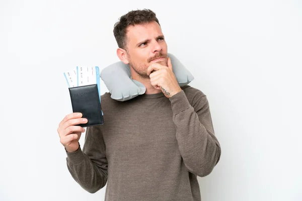 Young Caucasian Man Holding Passport Isolated White Background Having Doubts — Stockfoto
