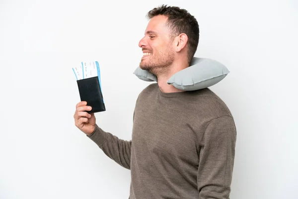 Young Caucasian Man Holding Passport Isolated White Background Laughing Lateral — Stockfoto