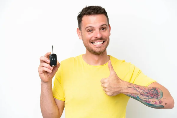 Young Man Holding Car Keys Isolated White Background Thumbs Because — Foto Stock
