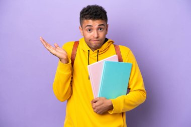 Young student Brazilian man isolated on purple background having doubts while raising hands