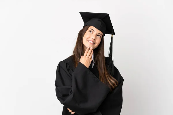 Teenager Brazilian University Graduate Isolated White Background Looking While Smiling — Zdjęcie stockowe