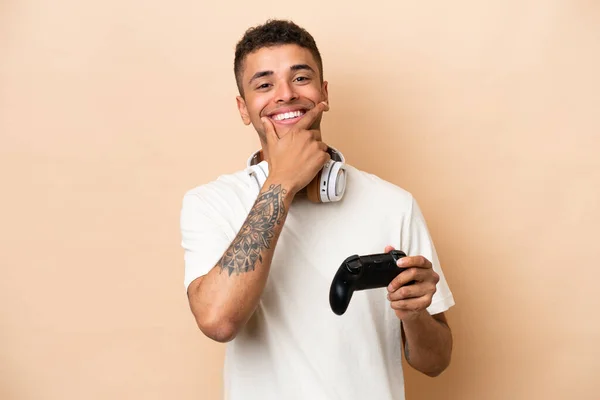 Young Brazilian Man Playing Video Game Controller Isolated Beige Background — Photo