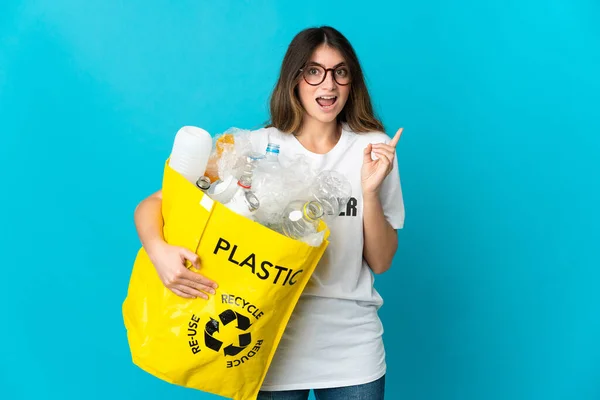 Woman Holding Bag Full Bottles Recycle Isolated Blue Background Intending — Stockfoto