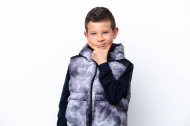 Little boy isolated on white background thinking