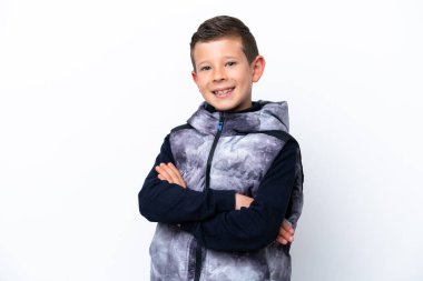 Little boy isolated on white background keeping the arms crossed in frontal position