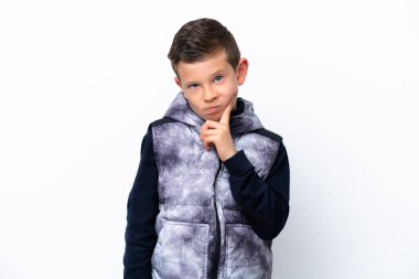 Little boy isolated on white background and thinking
