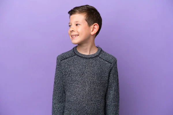 Little Boy Isolated Purple Background Looking Side — Photo