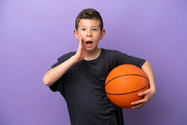 Little Boy Playing Basketball Isolated Purple Background Surprise Shocked Facial — Stockfoto