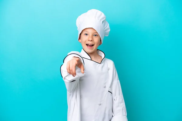 Little Chef Boy Isolated Blue Background Surprised Pointing Front — Foto Stock