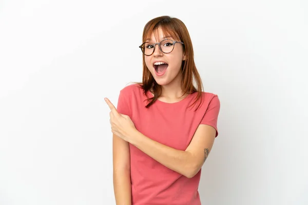 Redhead Girl Isolated White Background Surprised Pointing Side — Stockfoto