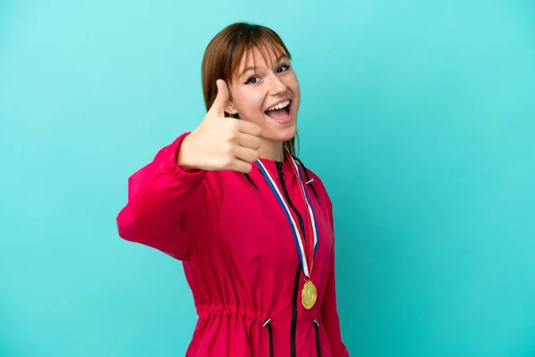 Redhead Girl Medals Isolated Blue Background Thumbs Because Something Good —  Fotos de Stock